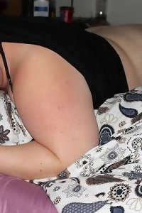Large, voluptuous chick posing provocatively