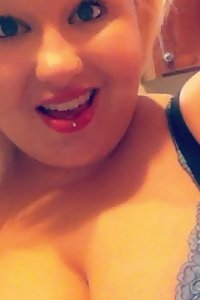 joyful lush woman happily twerking in skimpy lingerie